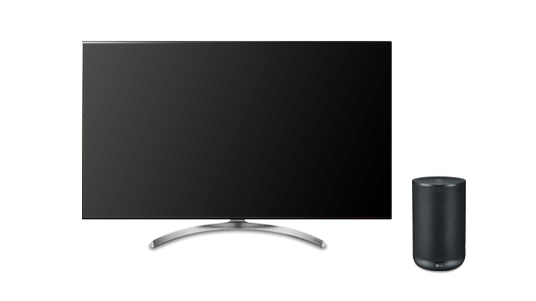 An LG television and wireless speaker.